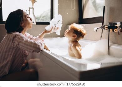 mom baths son|5,752 Mother Son Bath Images, Stock Photos, and。